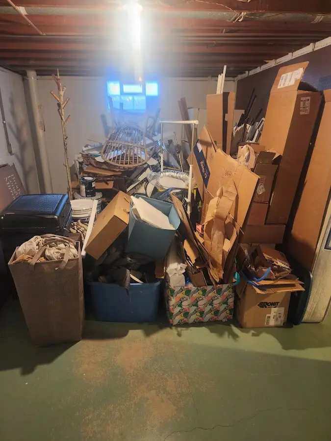 Roll-off dumpster container at job site for Yard Waste Dumpster Rental in South River